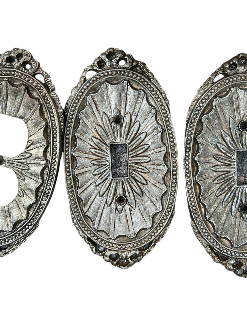 American Tack & Hardware Co | Vintage Starburst Brass Oval Wall Switch Plates